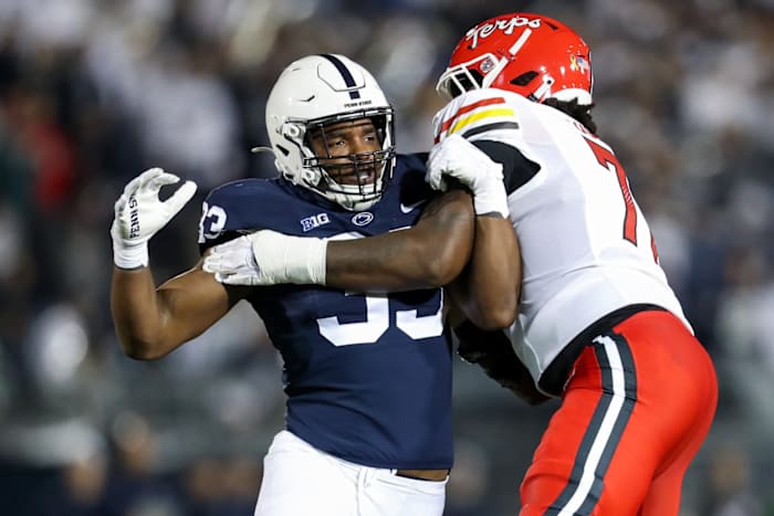 Nov 12, 2022; University Park, Pennsylvania, USA; Penn State Nittany Lions defensive end Dani Dennis-Sutton (33) tries to make his way passed Maryland Terrapins offensive linesman Jaelyn Duncan (71) during the third quarter at Beaver Stadium. Penn State defeated Maryland 30-0. Mandatory Credit: Matthew OHaren-USA TODAY Sports